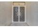 Close-up view of the decorative security screen door to the home's entrance at 15232 S 36Th Pl, Phoenix, AZ 85044