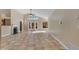 Spacious living room featuring a fireplace, tile floors, high ceilings, and sliding door access to the back yard at 15232 S 36Th Pl, Phoenix, AZ 85044