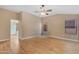 This main bedroom boasts a ceiling fan, neutral walls, and ensuite access at 15232 S 36Th Pl, Phoenix, AZ 85044