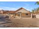 Covered patio with ample space for outdoor seating, overlooking the backyard's gravel landscaping at 15232 S 36Th Pl, Phoenix, AZ 85044