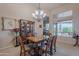 Dining room featuring a wooden table, chandelier, and a hutch cabinet at 16333 E Crystal Point Dr, Fountain Hills, AZ 85268