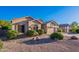 Charming single-story home featuring well-manicured landscaping and a two-car garage at 16333 E Crystal Point Dr, Fountain Hills, AZ 85268