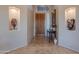Elegant foyer with tile flooring, niche displays, and a decorative entry table at 16333 E Crystal Point Dr, Fountain Hills, AZ 85268