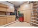 Organized garage with ample cabinet storage, various tools, and convenient shelving solutions at 16333 E Crystal Point Dr, Fountain Hills, AZ 85268