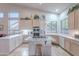 Spacious kitchen featuring granite countertops, a center island, and modern appliances at 16333 E Crystal Point Dr, Fountain Hills, AZ 85268
