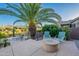 Outdoor patio space showcasing a fire pit and comfortable seating with desert views at 16333 E Crystal Point Dr, Fountain Hills, AZ 85268