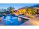 Beautiful pool and spa with water features, set in a lush, landscaped backyard retreat at 16333 E Crystal Point Dr, Fountain Hills, AZ 85268
