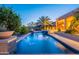 Stunning pool and spa with cascading water features in a well-landscaped backyard oasis at 16333 E Crystal Point Dr, Fountain Hills, AZ 85268