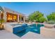 Beautiful pool with waterfall features, perfect for outdoor relaxation and entertainment at 16333 E Crystal Point Dr, Fountain Hills, AZ 85268