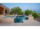 Stunning backyard pool area with integrated spa and lush desert landscaping at 16333 E Crystal Point Dr, Fountain Hills, AZ 85268