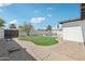 Spacious backyard with lush lawn, pool and privacy fencing perfect for outdoor living at 1653 E Palmcroft Dr, Tempe, AZ 85282