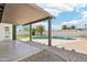 Covered patio overlooking the pool and backyard of this single Gathering home at 1653 E Palmcroft Dr, Tempe, AZ 85282