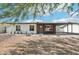 Charming single-story home featuring a desert landscape and covered parking at 1653 E Palmcroft Dr, Tempe, AZ 85282