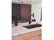 Kitchen sink with a modern faucet and stone countertops at 1653 E Palmcroft Dr, Tempe, AZ 85282