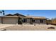 Charming single-story home boasts desert landscaping, a two-car garage, and a cozy front porch entrance at 1661 E Bishop Dr, Tempe, AZ 85282