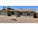 Charming single-story home boasts desert landscaping, a two-car garage, and a cozy front porch entrance at 1661 E Bishop Dr, Tempe, AZ 85282