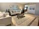 Inviting living room with neutral colors, tile floor, comfortable seating, and stylish decor for relaxed living at 1661 E Bishop Dr, Tempe, AZ 85282