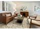 Comfortable living space features a view of living and dining areas, neutral colors, and tile floors at 1661 E Bishop Dr, Tempe, AZ 85282