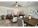 Comfortable living space features a view of living and dining areas, neutral colors, and tile floors at 1661 E Bishop Dr, Tempe, AZ 85282
