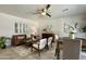 Comfortable living space features a view of living and dining areas, neutral colors, and tile floors at 1661 E Bishop Dr, Tempe, AZ 85282