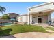 Beautiful backyard featuring a refreshing pool, verdant lawn, and a relaxing covered patio area at 1680 S Arroyo Ln, Gilbert, AZ 85295