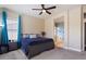 Comfortable bedroom boasts natural light, soft carpet, and neutral walls for a relaxing retreat at 1680 S Arroyo Ln, Gilbert, AZ 85295