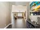 Open-concept living room with hardwood floors, comfortable seating, and a modern decor at 1680 S Arroyo Ln, Gilbert, AZ 85295