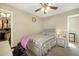 Comfortable bedroom with closet, carpet, and ceiling fan at 17820 W Charter Oak Rd, Surprise, AZ 85388