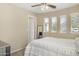 Bedroom with windows providing natural light at 17820 W Charter Oak Rd, Surprise, AZ 85388