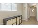 Hallway with neutral walls and tile flooring at 17820 W Charter Oak Rd, Surprise, AZ 85388