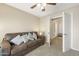 Comfortable living room with a leather couch at 17820 W Charter Oak Rd, Surprise, AZ 85388