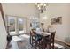 Bright dining room boasts lots of natural light and backyard views at 18121 W Las Cruces Dr, Goodyear, AZ 85338