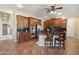 Spacious kitchen features granite countertops, a large island, and stainless appliances at 18121 W Las Cruces Dr, Goodyear, AZ 85338