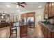 Spacious kitchen with stainless steel appliances, granite counters, and an island with bar seating at 18121 W Las Cruces Dr, Goodyear, AZ 85338