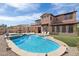 Beautiful backyard with a pool, spa, and patio, creating the perfect outdoor retreat at 18121 W Las Cruces Dr, Goodyear, AZ 85338