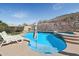 Stunning backyard pool and spa with beautiful desert landscape views at 18121 W Las Cruces Dr, Goodyear, AZ 85338
