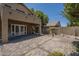 Charming backyard patio and verdant backyard with elegant pavers at 1838 W Enfield Way, Chandler, AZ 85286