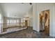 This living room features a stair case, neutral colors and plenty of natural light at 1838 W Enfield Way, Chandler, AZ 85286