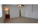Spacious bedroom with ceiling fan, en-suite bathroom, and walk-in closet provides comfort and convenience at 18644 N 5Th Ave, Phoenix, AZ 85027