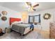 Bedroom with ceiling fan, window seat, and decor at 18644 N 5Th Ave, Phoenix, AZ 85027