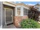 Charming entryway featuring a decorative security door and colorful landscaping at 18644 N 5Th Ave, Phoenix, AZ 85027