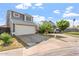 Charming two-story home boasts a well-manicured lawn and a two-car garage at 18644 N 5Th Ave, Phoenix, AZ 85027