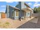 Exterior view of a two-story home with gravel landscaping and a covered patio at 18644 N 5Th Ave, Phoenix, AZ 85027