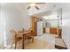 Eat-in kitchen showcasing ample natural light, wood cabinets, and tile flooring at 18644 N 5Th Ave, Phoenix, AZ 85027