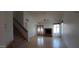Inviting living room with a fireplace, staircase, and natural light creates a warm and spacious ambiance at 18644 N 5Th Ave, Phoenix, AZ 85027