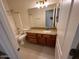 Bathroom features granite countertop vanity and tiled tub-shower combo at 20985 N 81St Dr, Peoria, AZ 85382