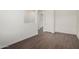 Hallway featuring wood-look tile flooring and white walls at 22417 W Loma Linda Blvd, Buckeye, AZ 85326