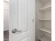 Pantry with white shelves and a white door at 22417 W Loma Linda Blvd, Buckeye, AZ 85326