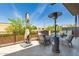 Spacious balcony with outdoor seating, a heat lamp, and a beautiful view at 2300 E Campbell Ave # 114, Phoenix, AZ 85016