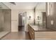 Contemporary bathroom with double sink vanity, and doorway view into bedroom at 2300 E Campbell Ave # 114, Phoenix, AZ 85016